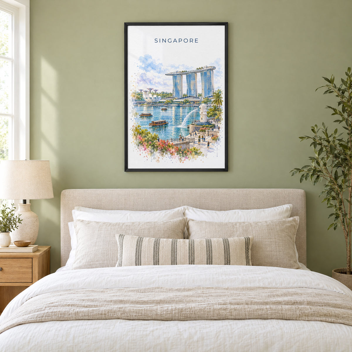 Singapore watercolor print in a black frame above an upholstered headboard in a sage green bedroom