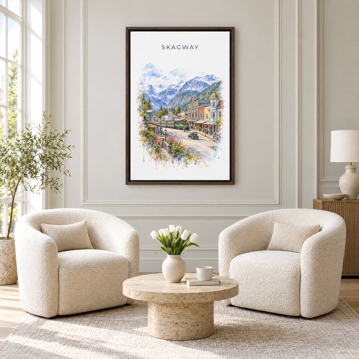Skagway, Alaska watercolor print as an espresso floater canvas above two boucle armchairs in a hotel lounge