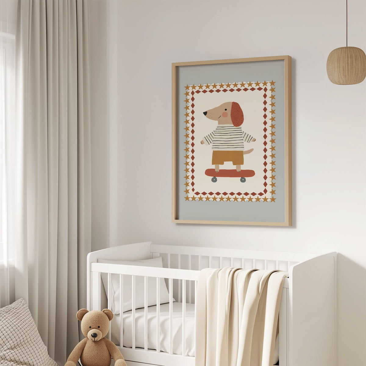 Skateboard dog star frame nursery print in an oak frame above a white crib with a teddy bear