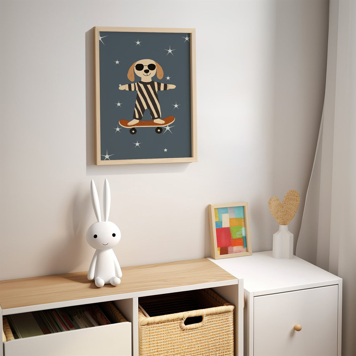 Skateboard dog starry night nursery print in an oak frame above a kids cubby shelf with a woven basket and bunny lamp