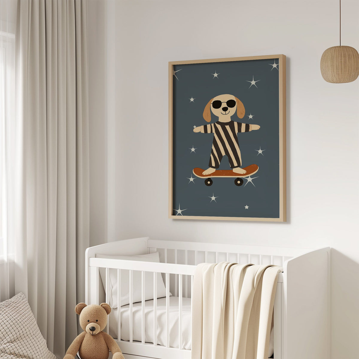 Skateboard dog starry night nursery print in an oak frame above a white crib with a teddy bear