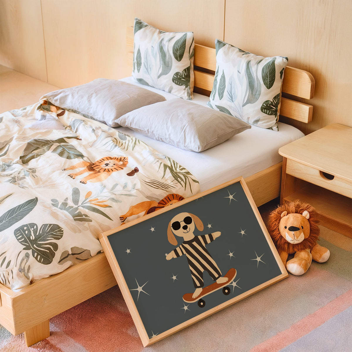 Landscape skateboard dog starry night nursery print in an oak frame leaning on a kids bed by a lion plush