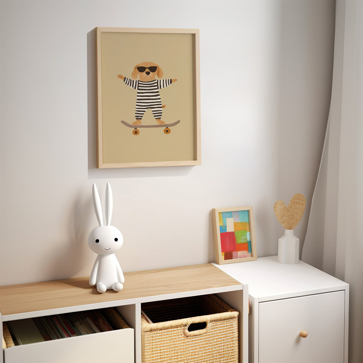 Skateboard dog striped onesie nursery print in an oak frame above a kids cubby shelf with a woven basket and bunny lamp