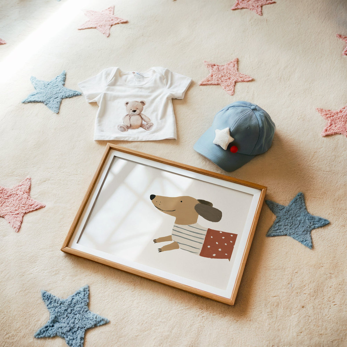 Landscape smiling dachshund close-up nursery print in a matted oak frame on a star rug with a baby tee