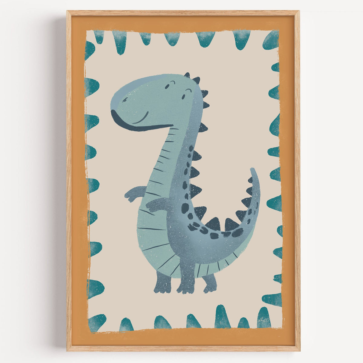 Smiling teal dinosaur nursery print in a light oak frame on a plain white wall