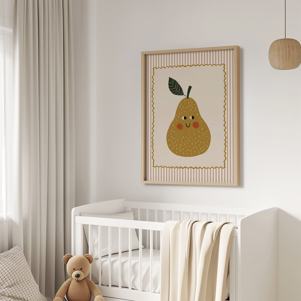 Smiling pear pink stripe nursery print in an oak frame above a white crib with a teddy bear