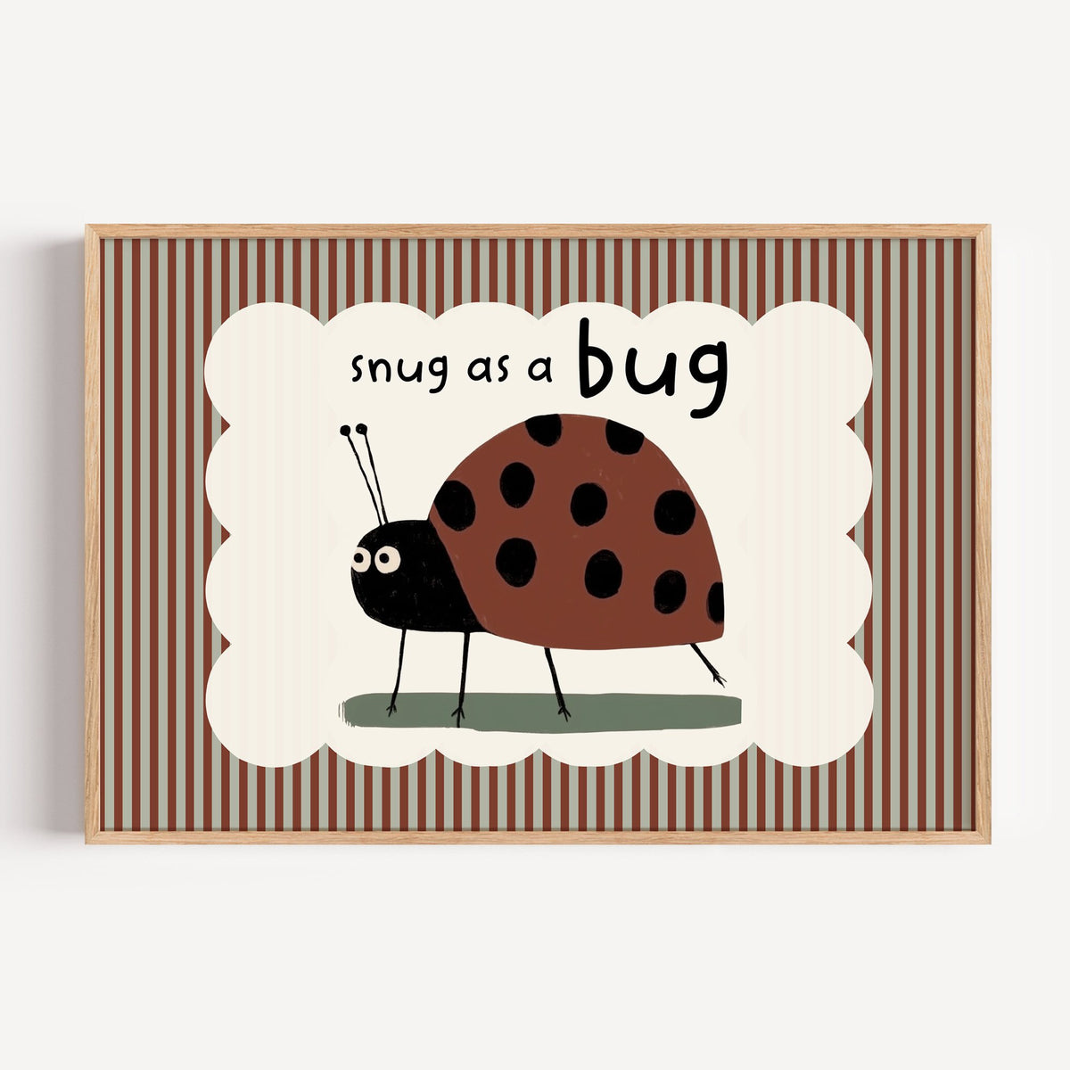 Landscape snug as a bug ladybug nursery print in a light oak frame on a plain white wall