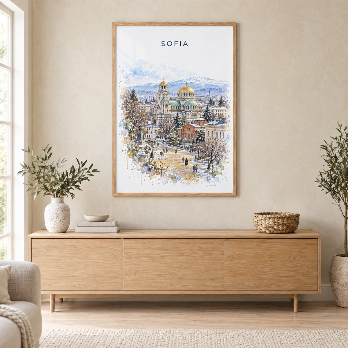 Sofia, Bulgaria watercolor print in an oak frame above a light wood sideboard in a Scandinavian living room