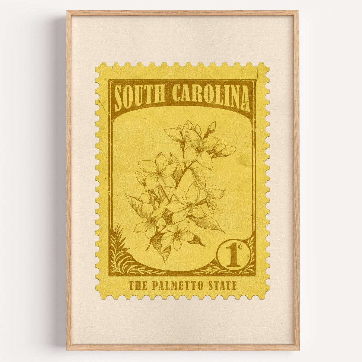 South Carolina state flower stamp print in olive gold on pale yellow, light oak frame on a white wall