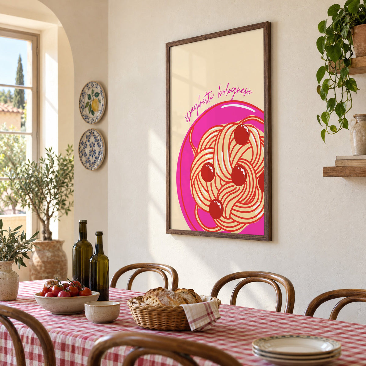 Spaghetti bolognese pink plate print in a walnut frame above a gingham-covered trattoria table, seen at an angle