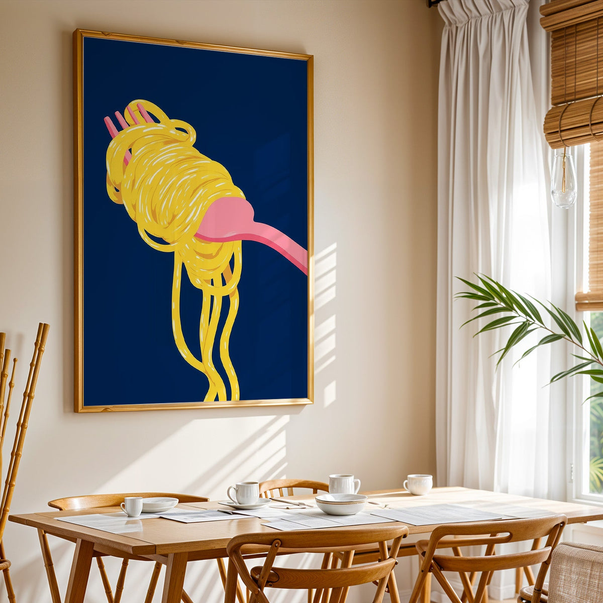 Spaghetti navy print shown in a gold frame above a breakfast table by a curtained window