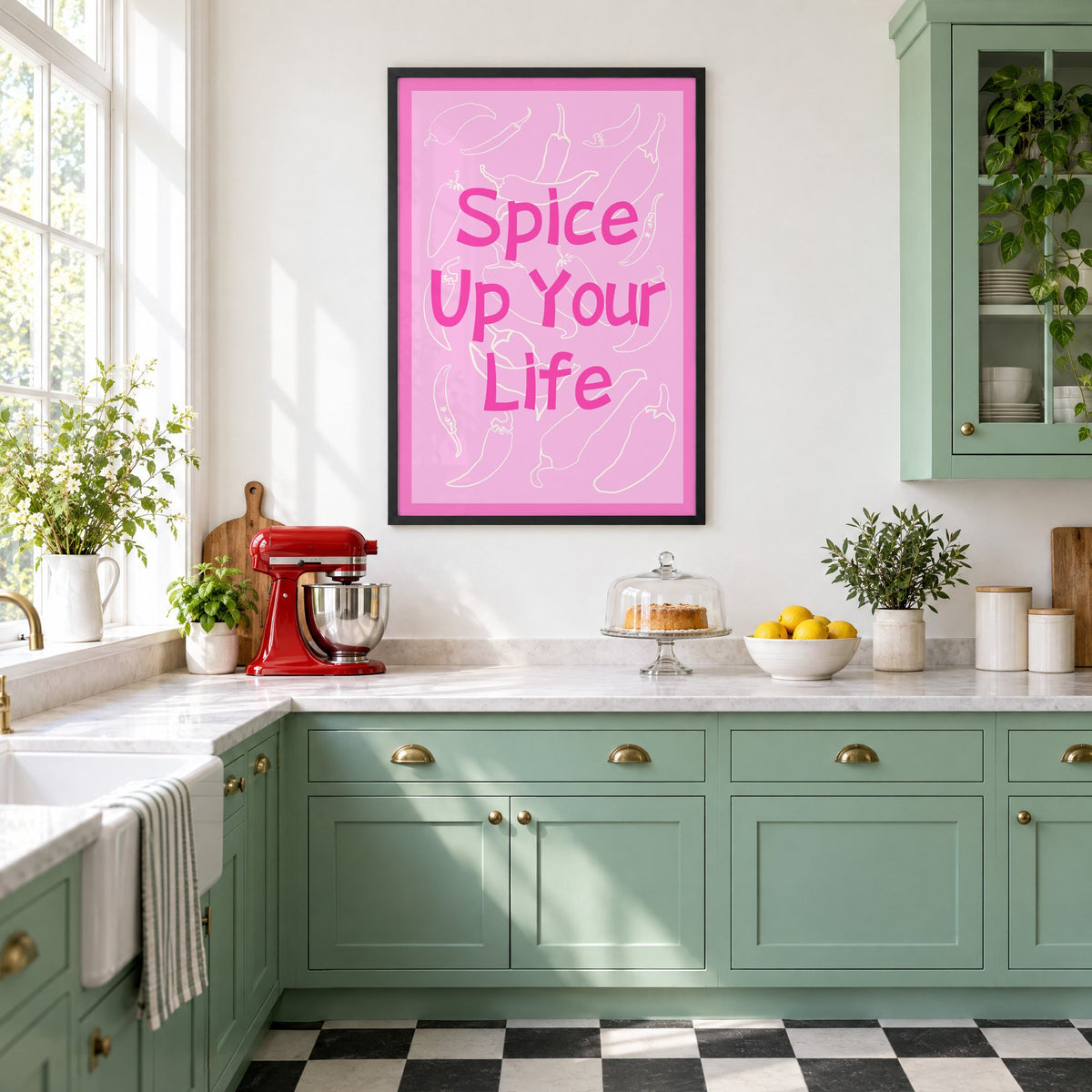 Spice Up Your Life pink chilli print in a black frame in a mint green retro kitchen above a red stand mixer