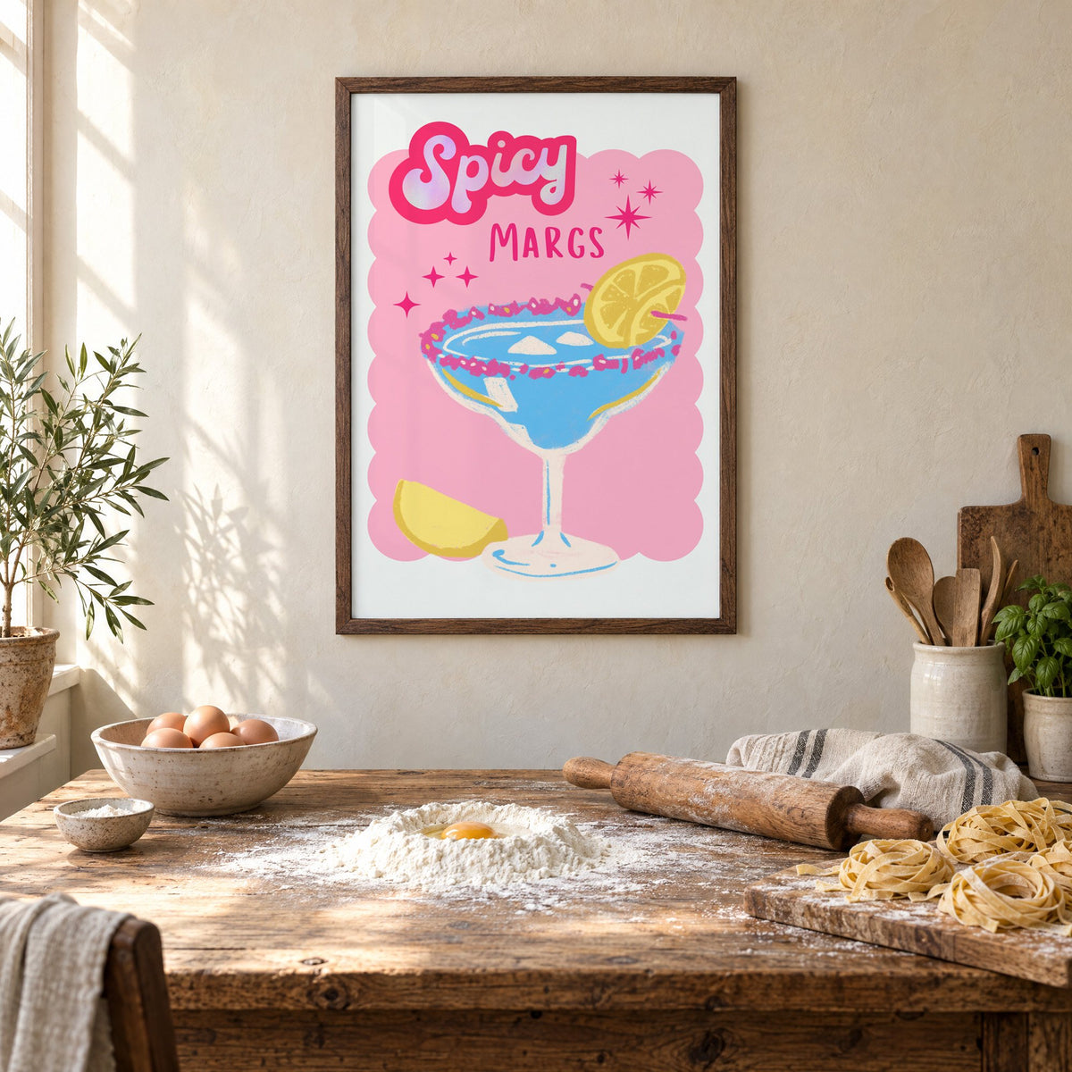 Spicy Margs blue margarita print in a walnut frame above a rustic table set for making fresh pasta