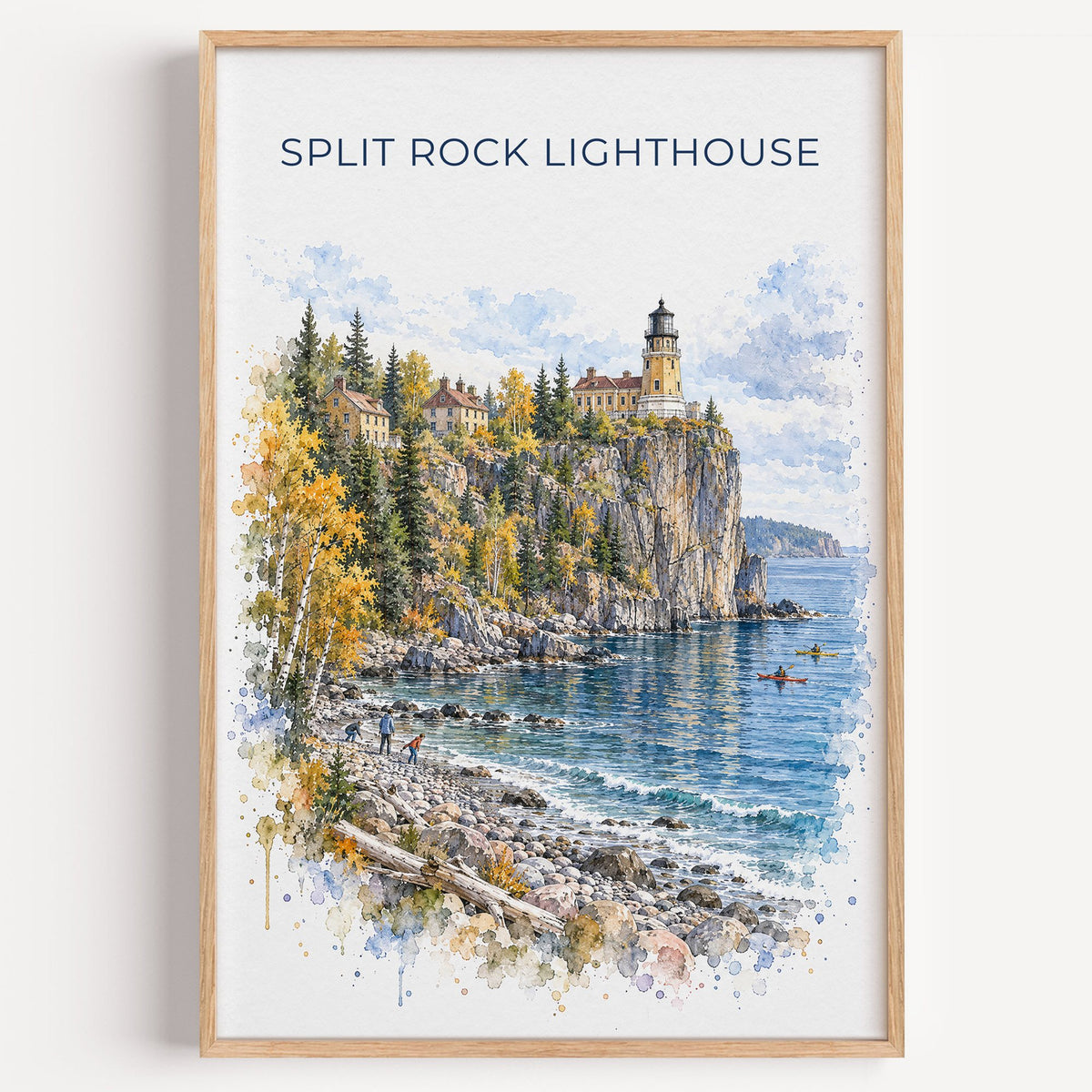 Split Rock Lighthouse watercolor print in a light oak frame on a plain white wall