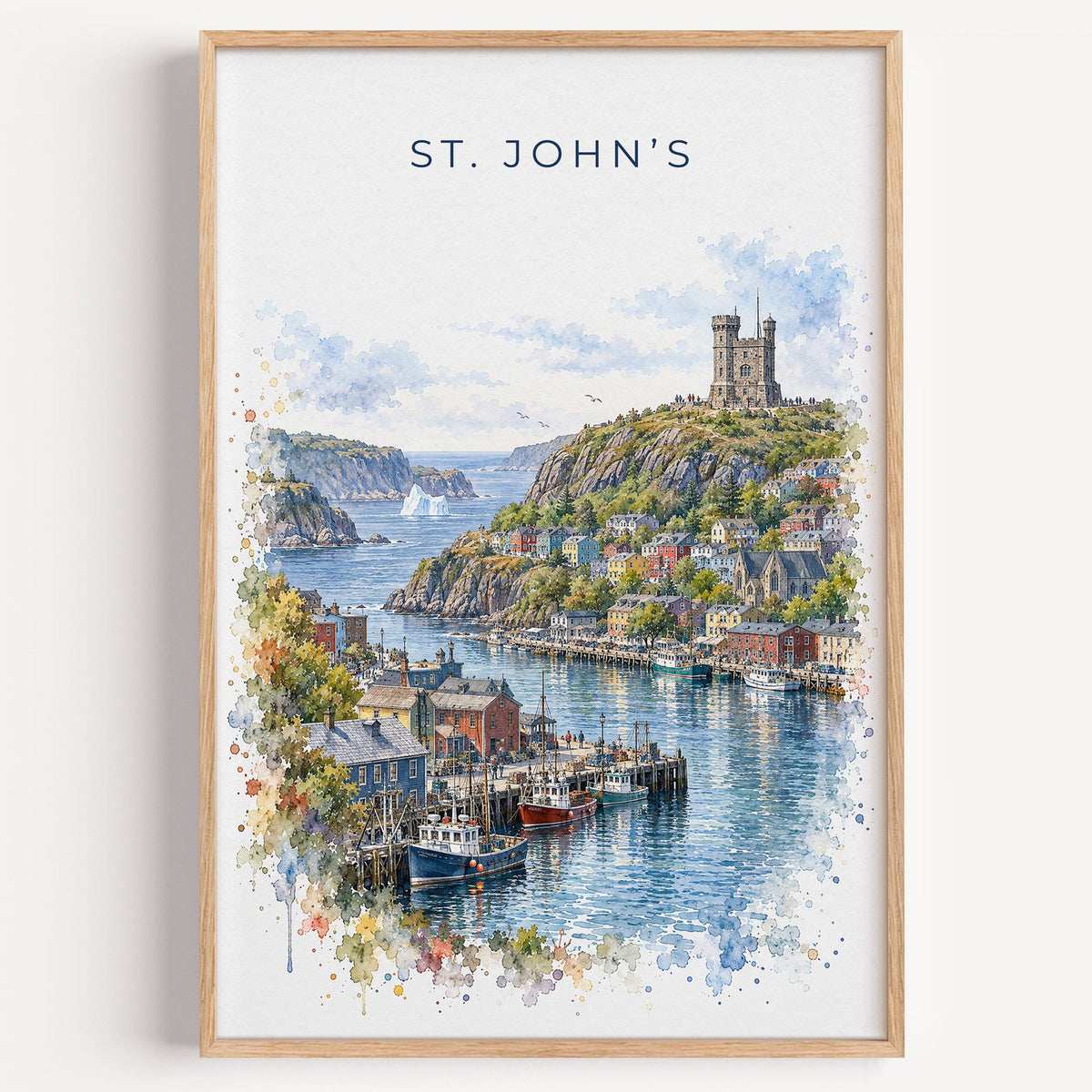 St. John's watercolor print in a light oak frame on a plain white wall