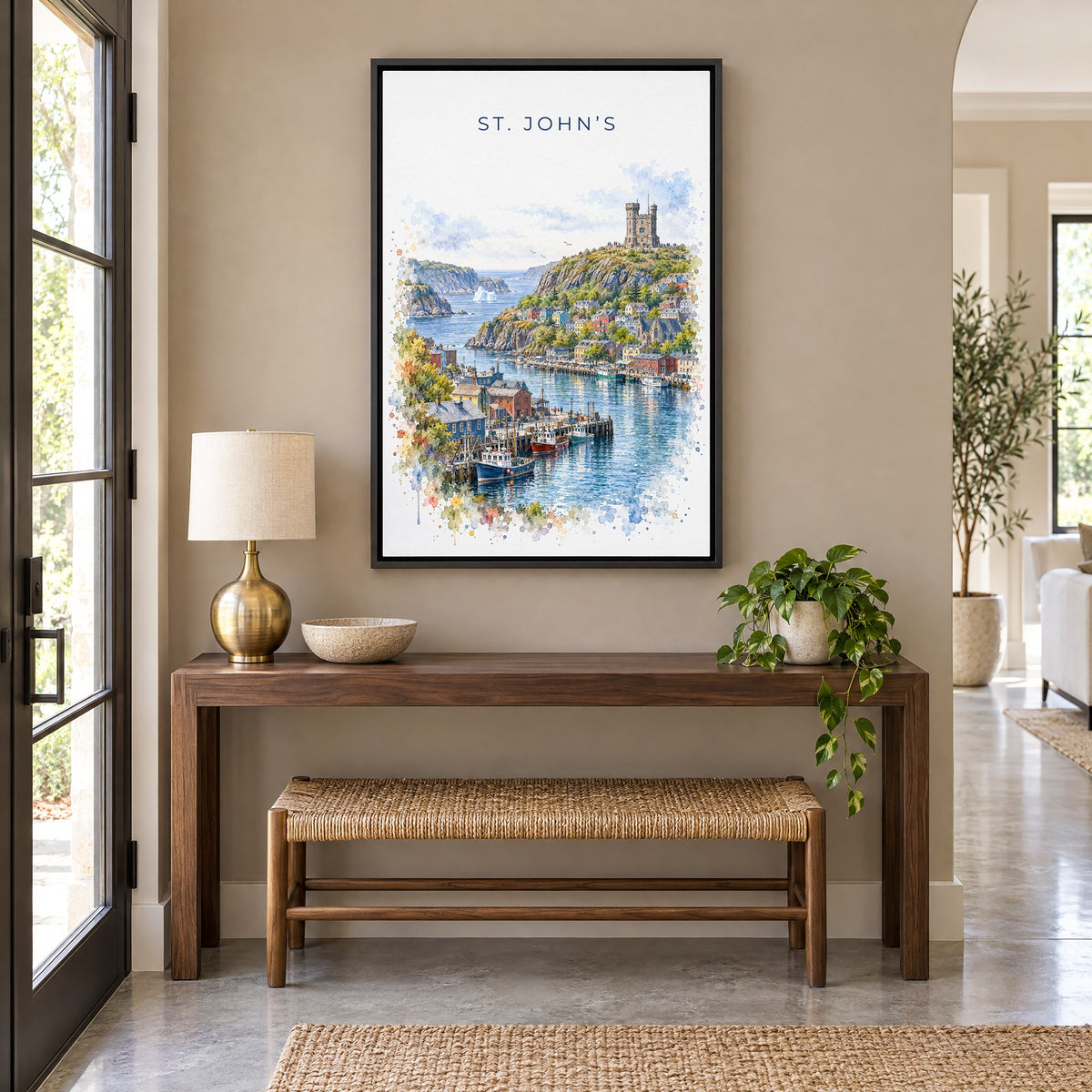 St. John's watercolor print as a black floater canvas above a walnut console and woven bench in an entryway
