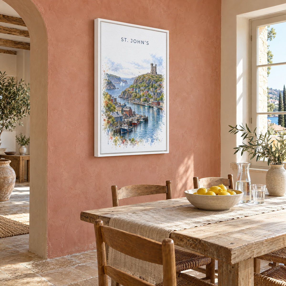 St. John's watercolor print as a white floater canvas on a terracotta wall above a rustic dining table