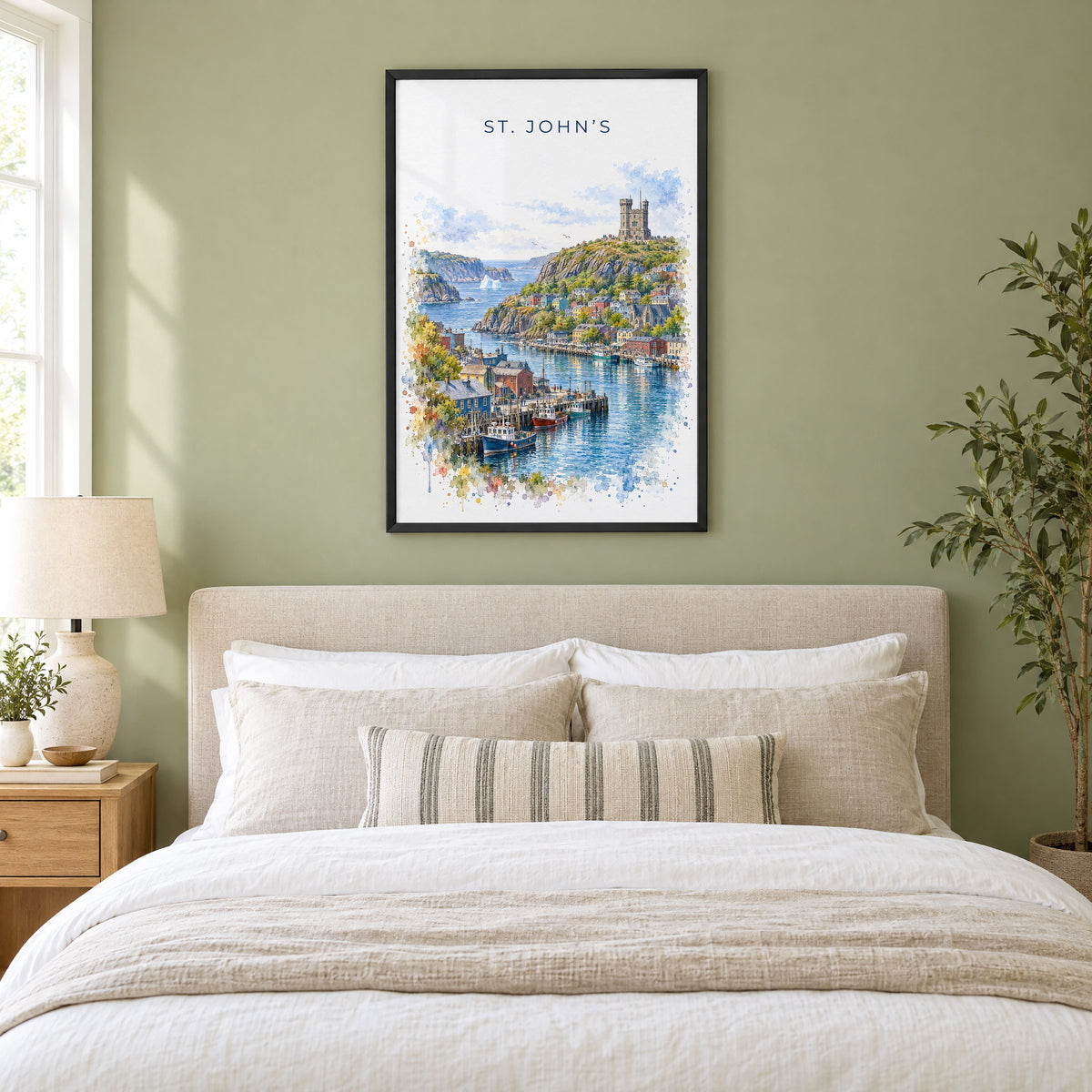 St. John's watercolor print in a black frame above an upholstered headboard in a sage green bedroom