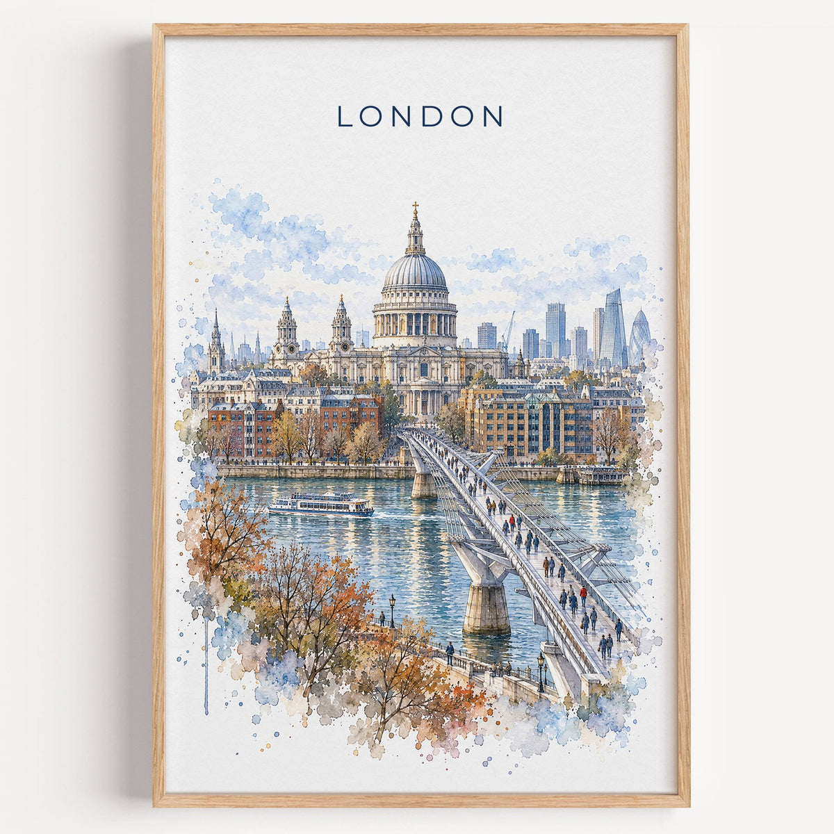 St. Paul's Cathedral watercolor print in a light oak frame on a plain white wall