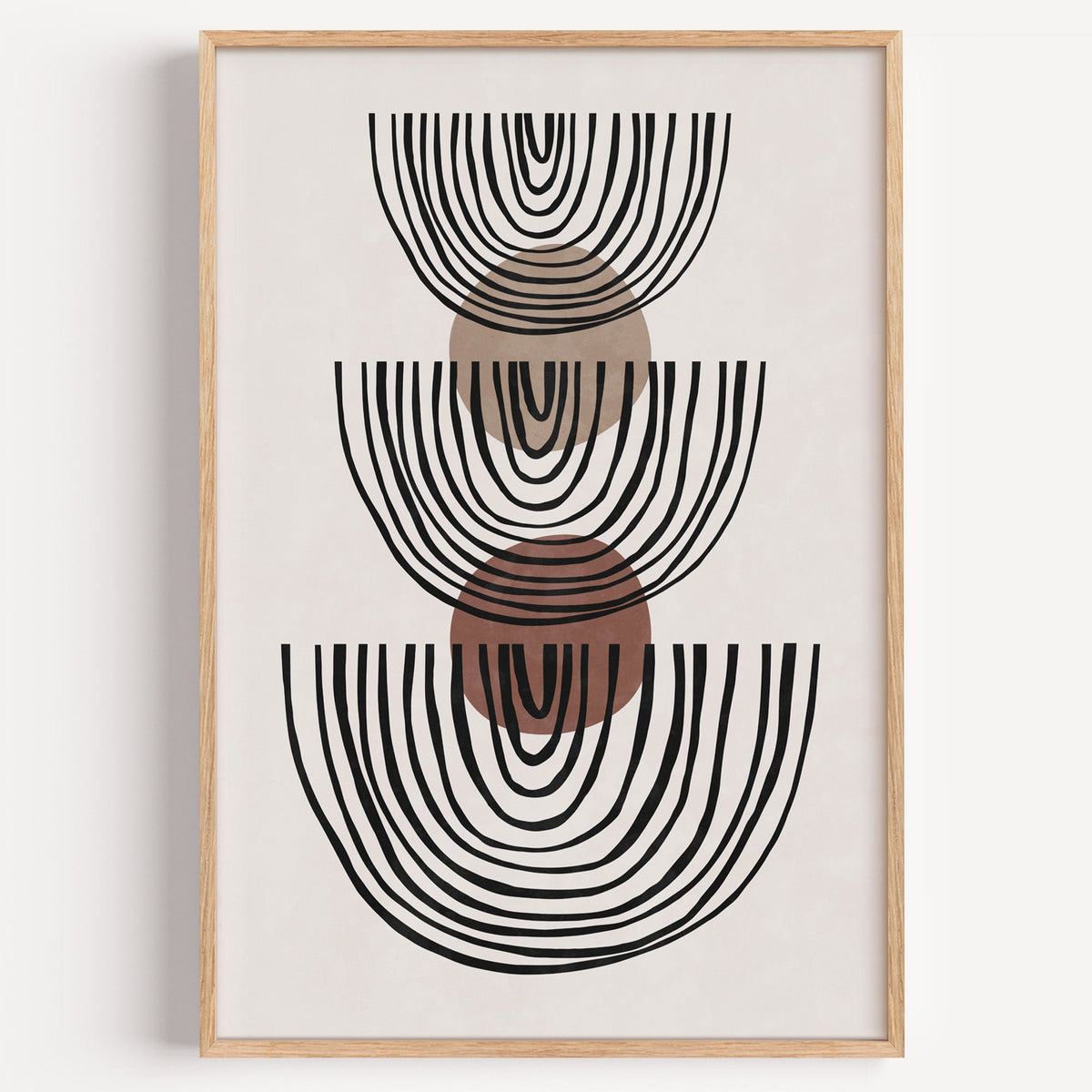 Stacked line bowls and circles boho line art print in a light oak frame on a plain white wall