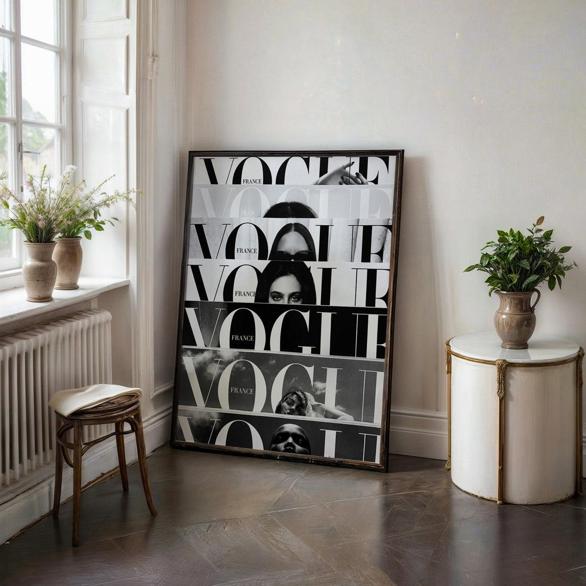 Seven cropped magazine cover strips with face print in a black frame on a dark stone floor beside a white side table
