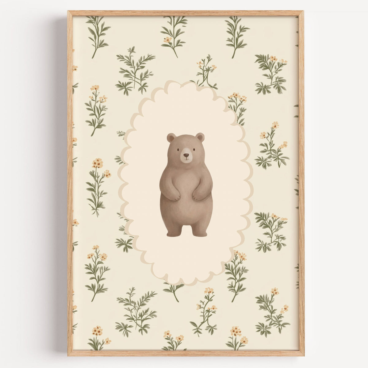 Standing bear on wildflower wallpaper nursery print in a light oak frame on a plain white wall