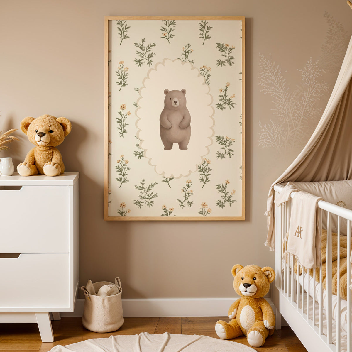 Standing bear on wildflower wallpaper nursery print in an oak frame between a white dresser and a canopy crib