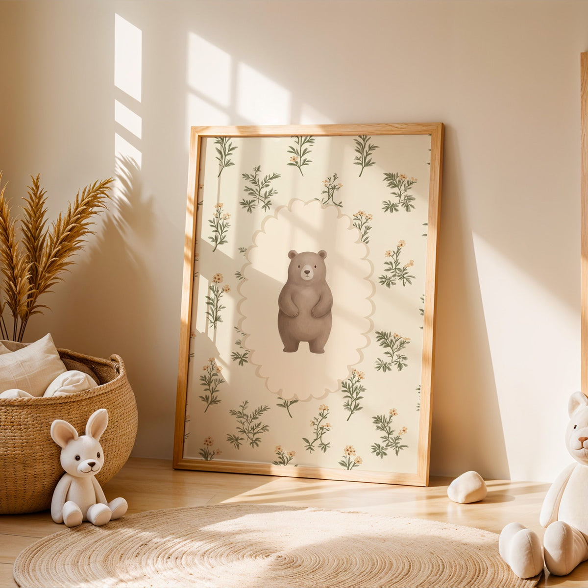 Standing bear on wildflower wallpaper nursery print in an oak frame leaning on a sunlit floor by a woven basket