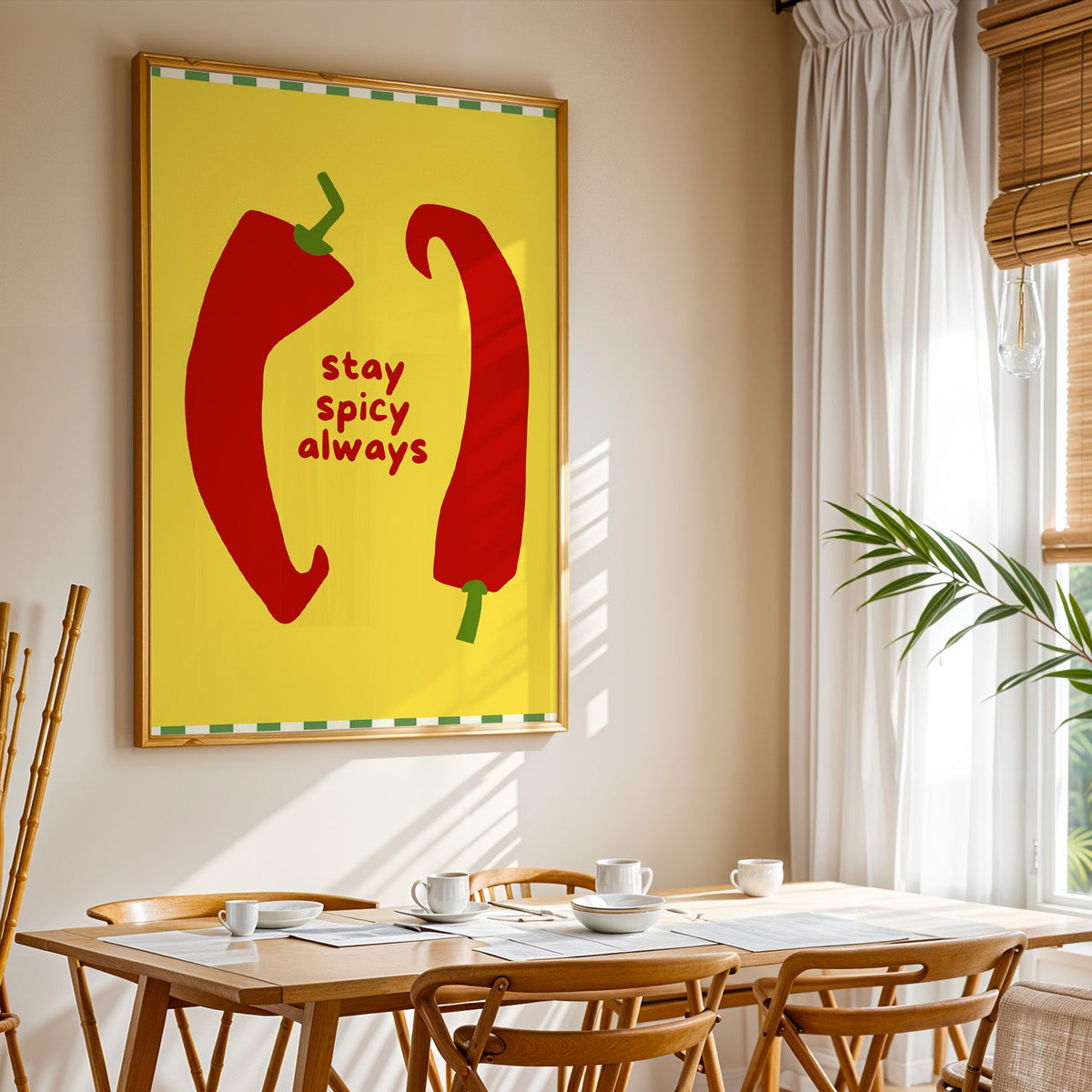 Stay Spicy Always print shown in a gold frame above a breakfast table by a curtained window