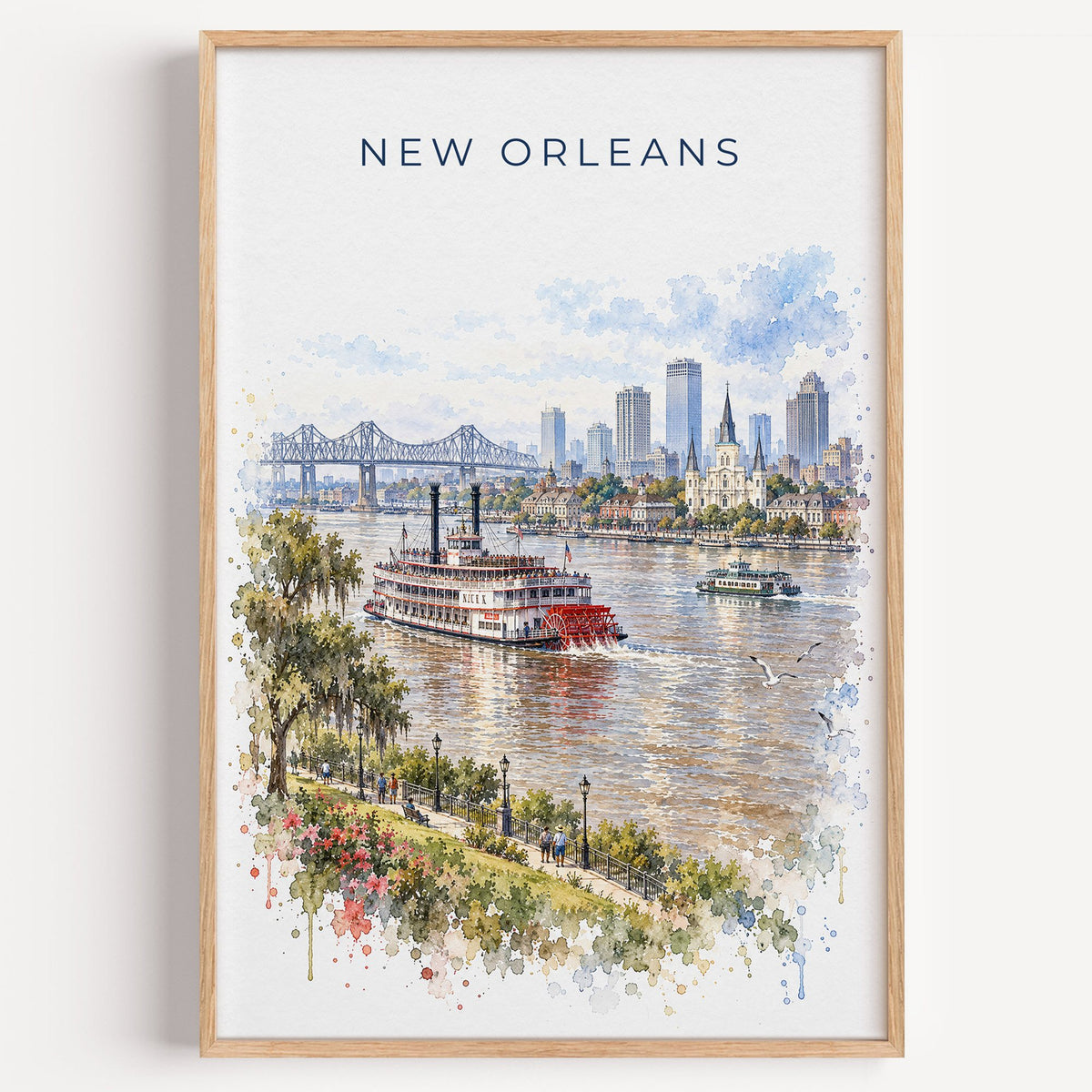 Steamboat Natchez watercolor print in a light oak frame on a plain white wall