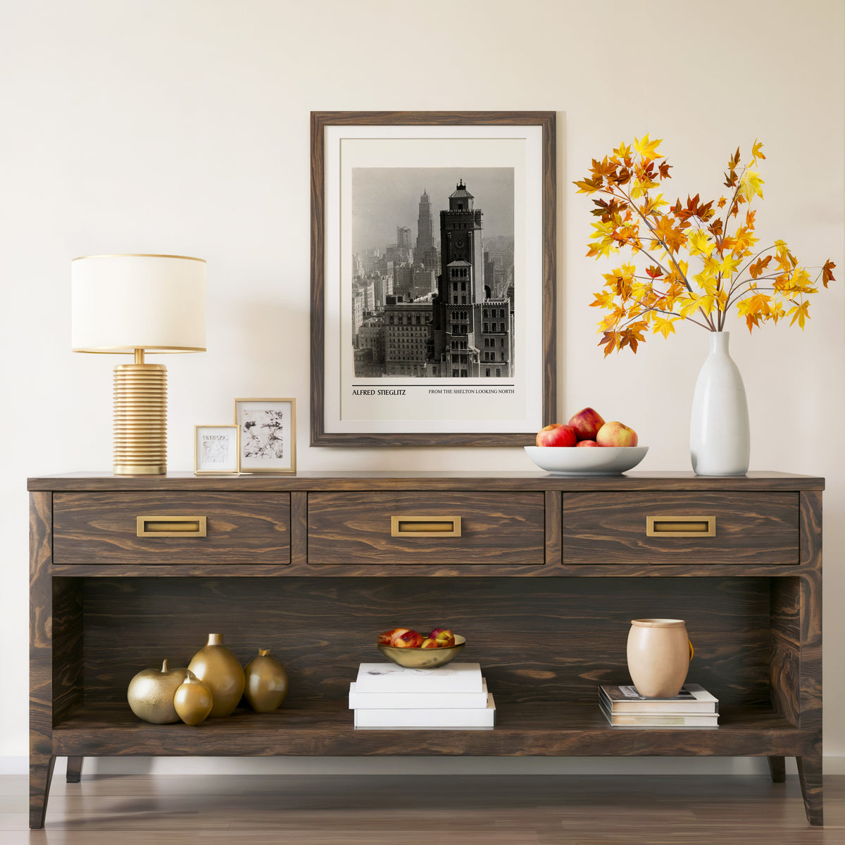 From the Shelton Looking North print in a walnut frame above a console with autumn branches