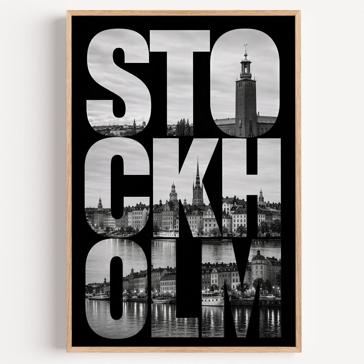 Stockholm letters filled with city photo print in a light oak frame on a plain white wall