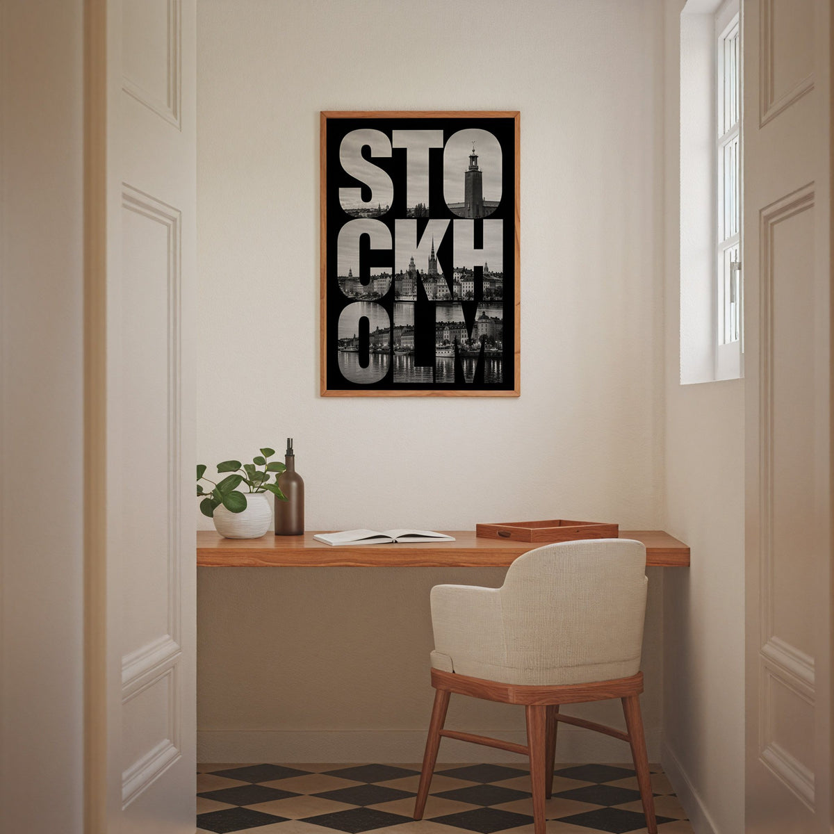 Stockholm letters filled with city photo print in an oak frame above a home office desk nook