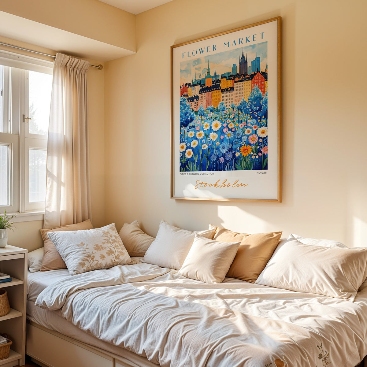 Stockholm flower market print in an oak frame above a cream daybed in a sunny bedroom