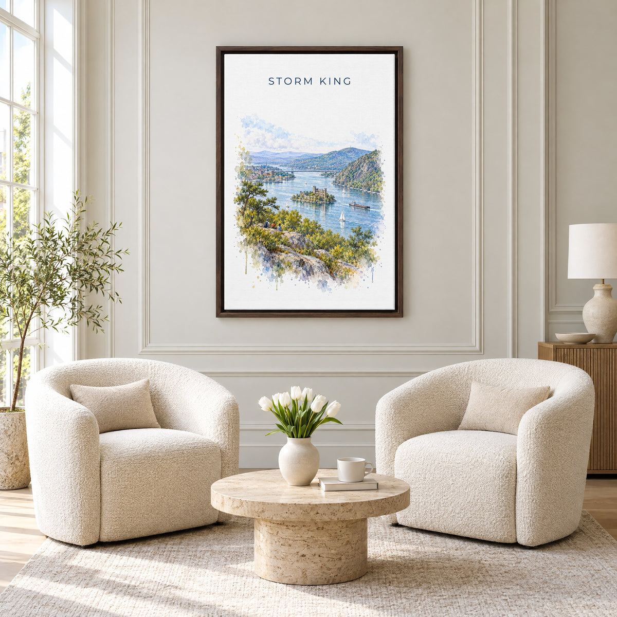 Storm King State Park watercolor print as an espresso floater canvas above two boucle armchairs in a hotel lounge