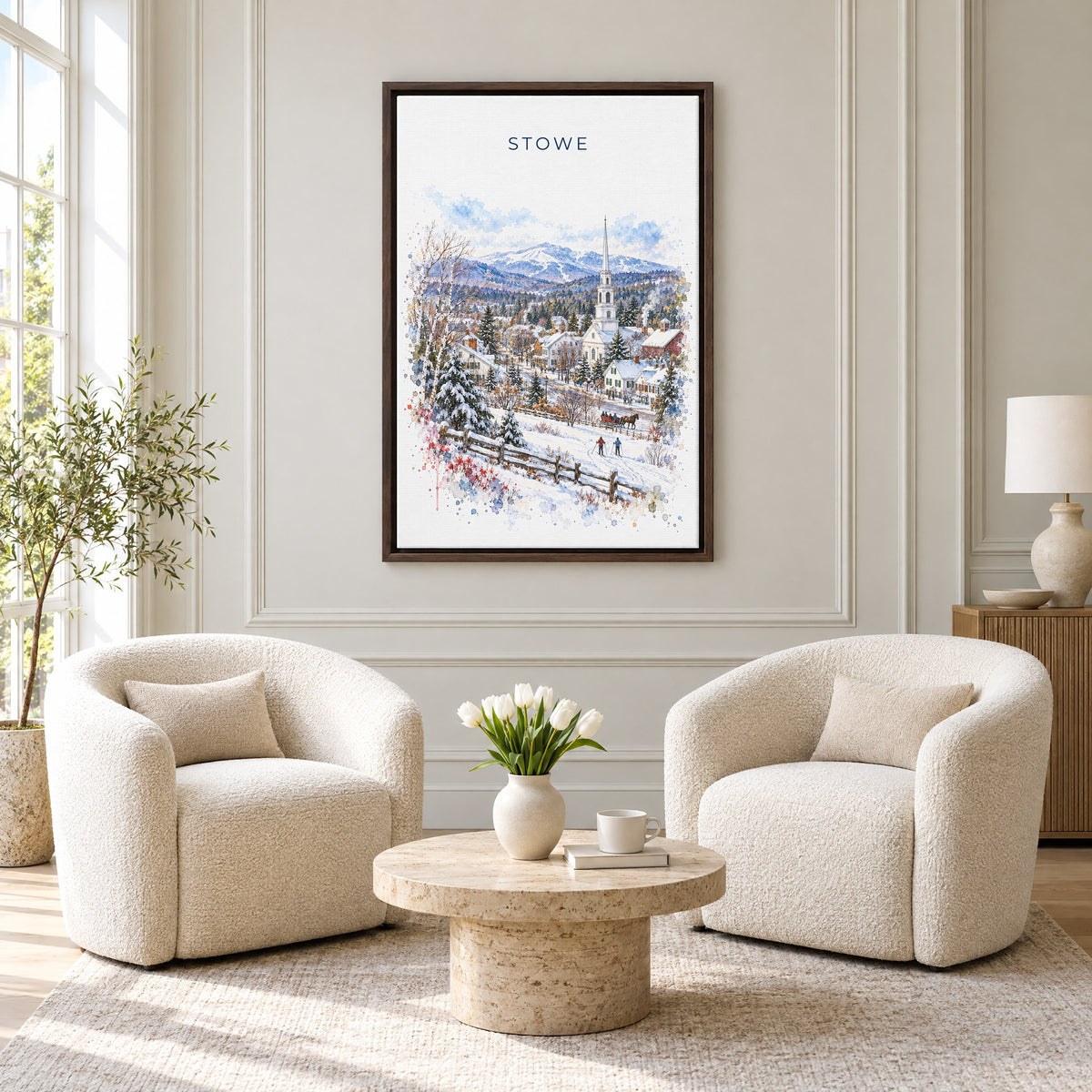 Stowe, Vermont watercolor print as an espresso floater canvas above two boucle armchairs in a hotel lounge