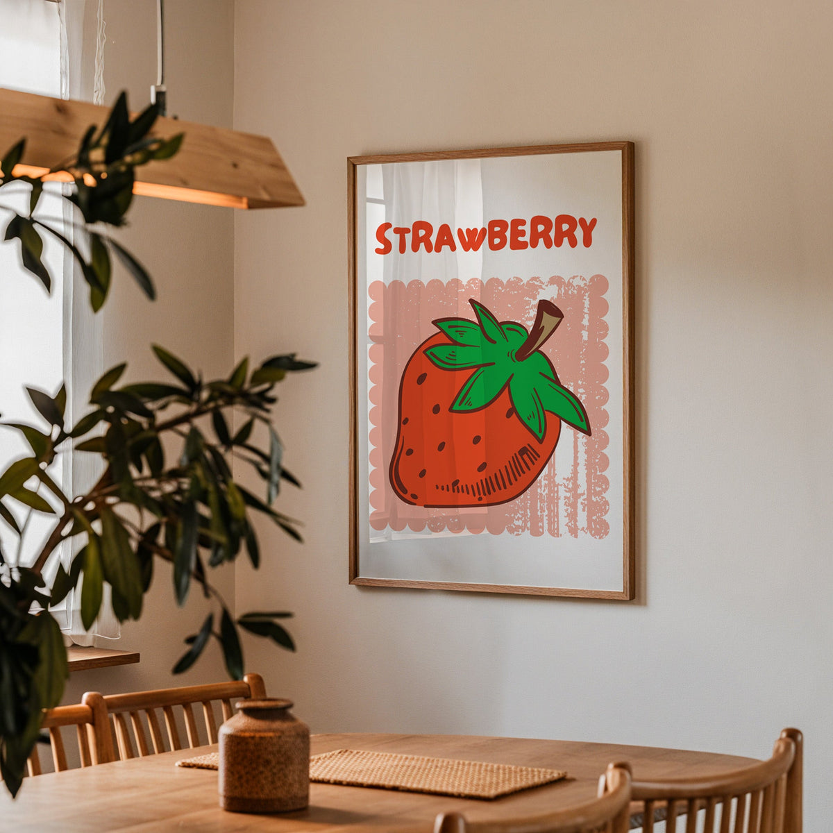 Strawberry scallop print in a walnut frame above a dining table with olive branches