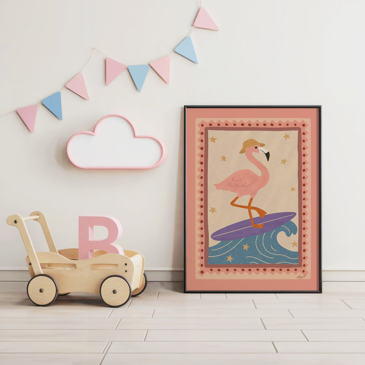 Flamingo on purple surfboard nursery print in a black frame under pastel bunting by a wooden baby walker