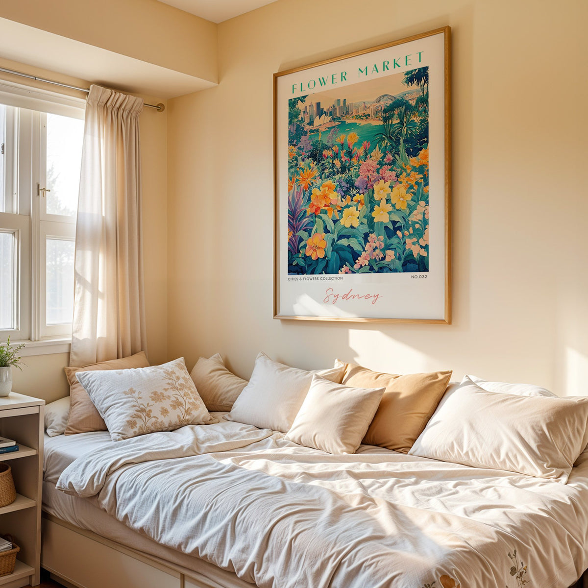 Sydney flower market print in an oak frame above a cream daybed in a sunny bedroom