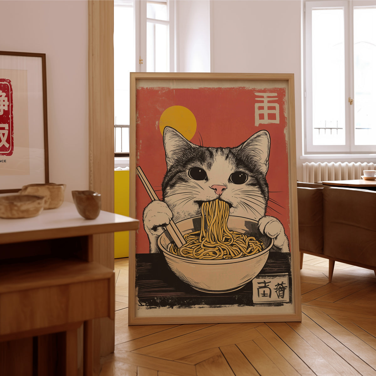 Gray tabby cat eating ramen print in an oak frame on the parquet floor of a sunlit living room