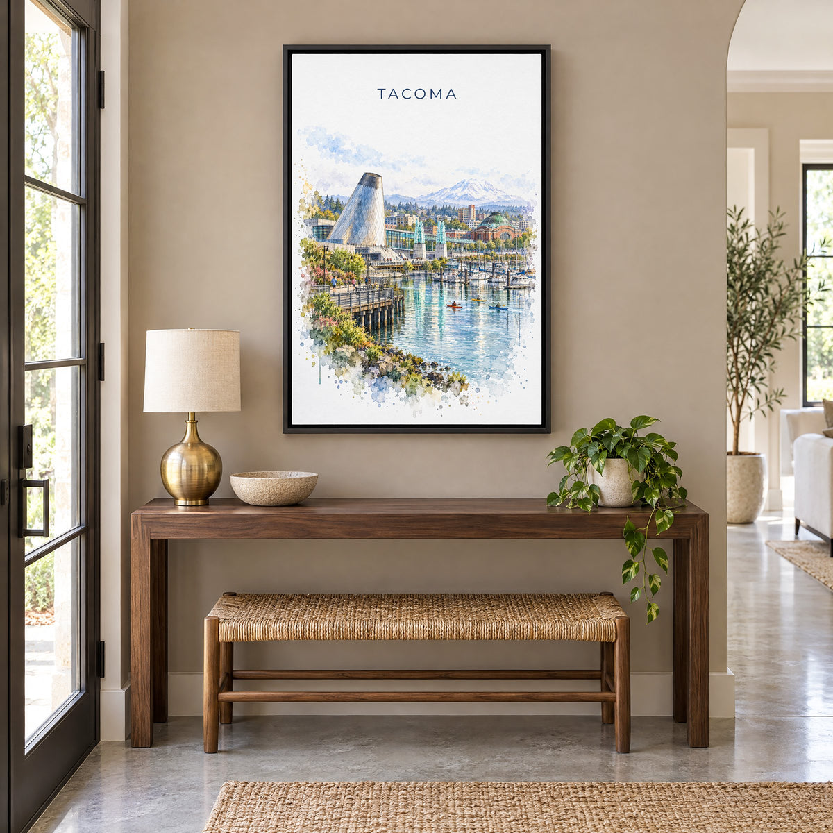 Tacoma watercolor print as a black floater canvas above a walnut console and woven bench in an entryway