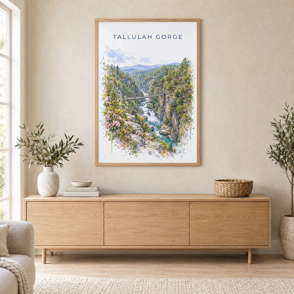 Tallulah Gorge watercolor print in an oak frame above a light wood sideboard in a Scandinavian living room