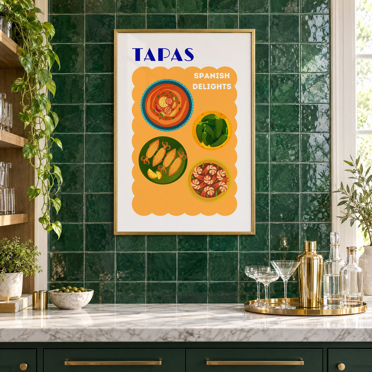 TAPAS Spanish Delights four plates print in a brass frame on emerald green tiles above a home bar with coupe glasses