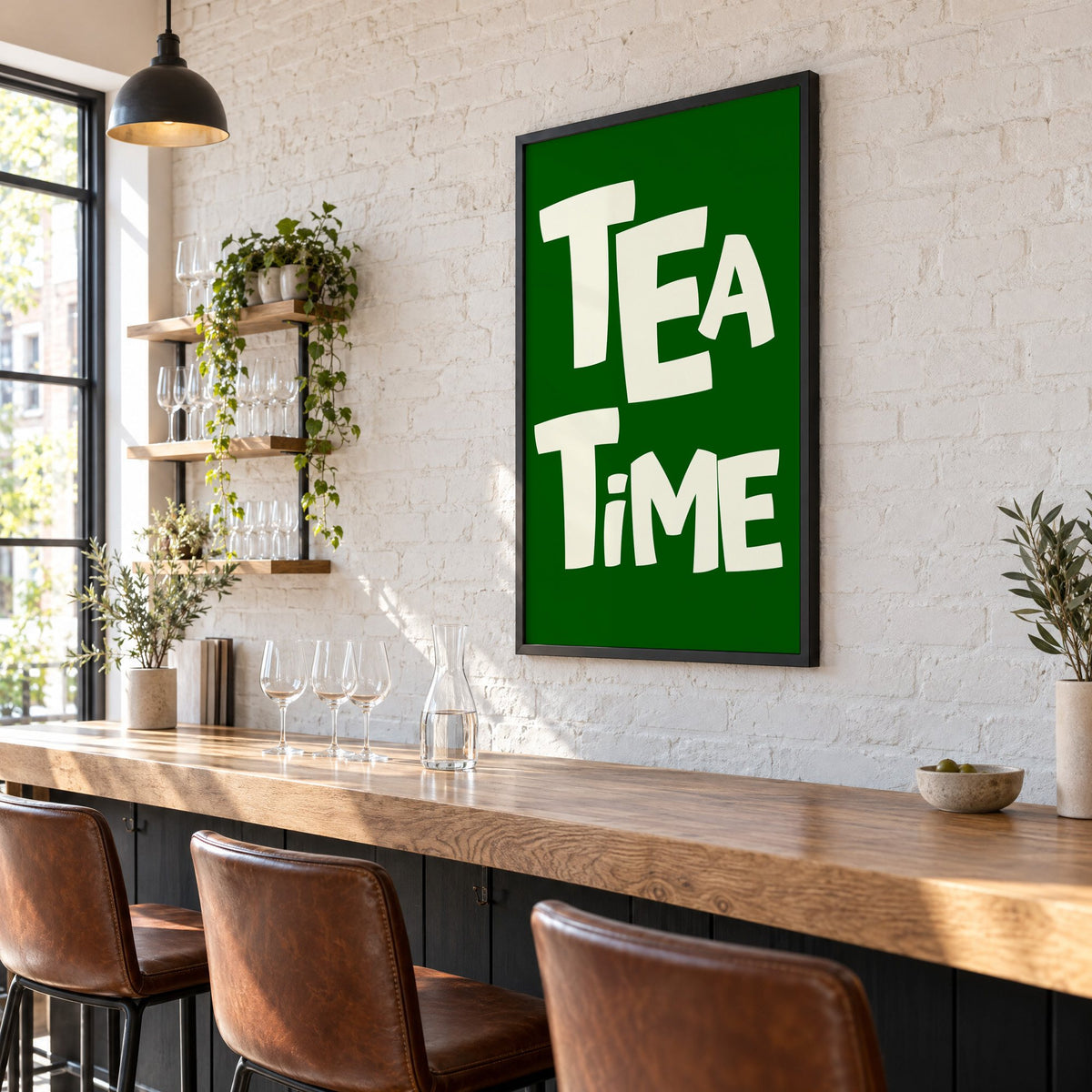 TEA TiME green typography print in a black frame on a white brick wall above a wine bar counter