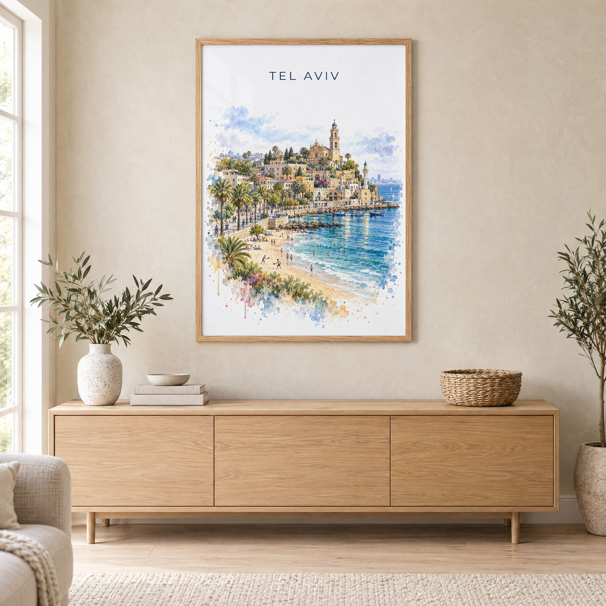 Tel Aviv watercolor print in an oak frame above a light wood sideboard in a Scandinavian living room