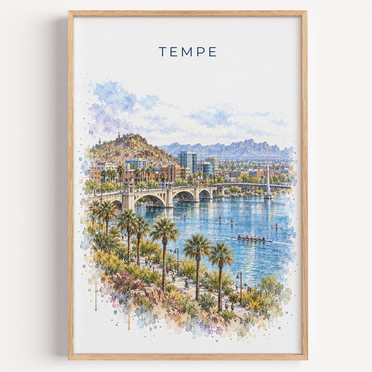 Tempe watercolor print in a light oak frame on a plain white wall