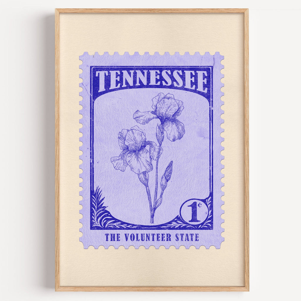 Tennessee state flower stamp print in indigo on periwinkle, light oak frame on a plain white wall