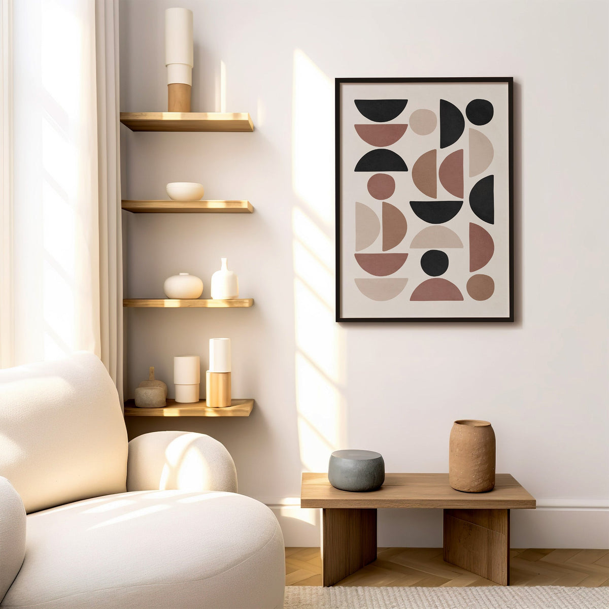 Terracotta and black half circle mosaic print in a black frame above a low wood bench beside floating oak shelves
