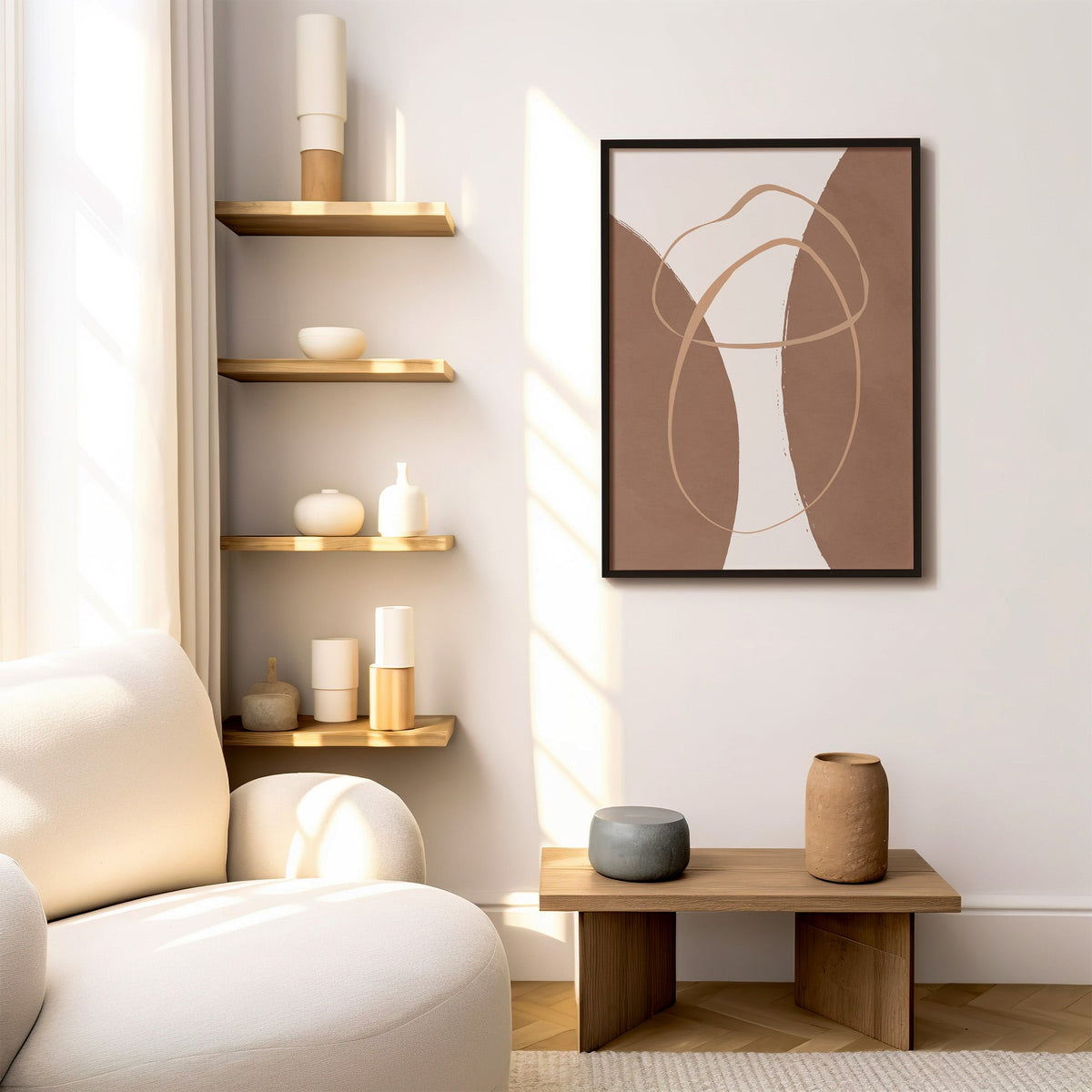 Terracotta twin arches and loops boho print in a black frame above a low wood bench beside floating oak shelves