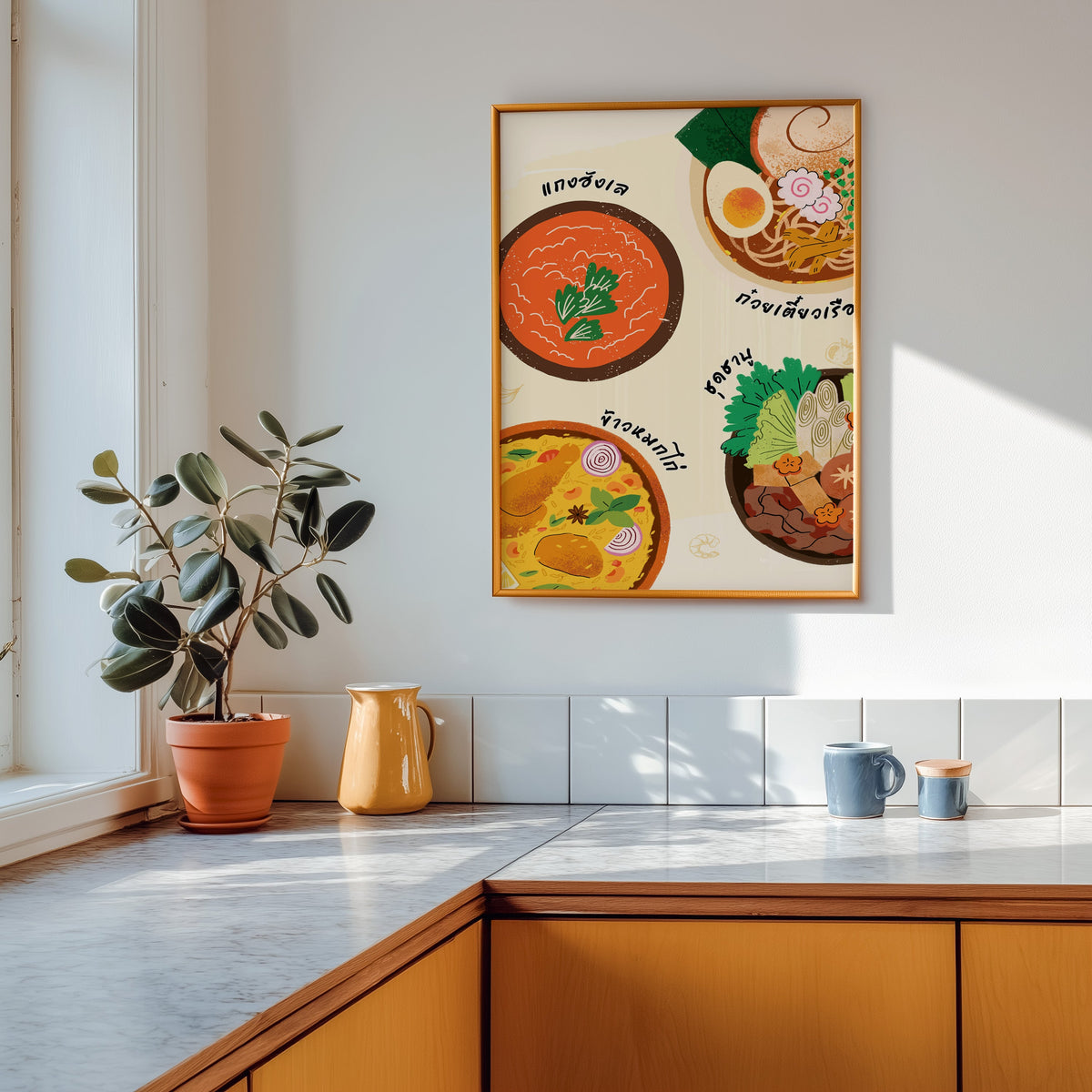 Thai food bowls print shown in a gold frame above a marble counter with a yellow ceramic jug